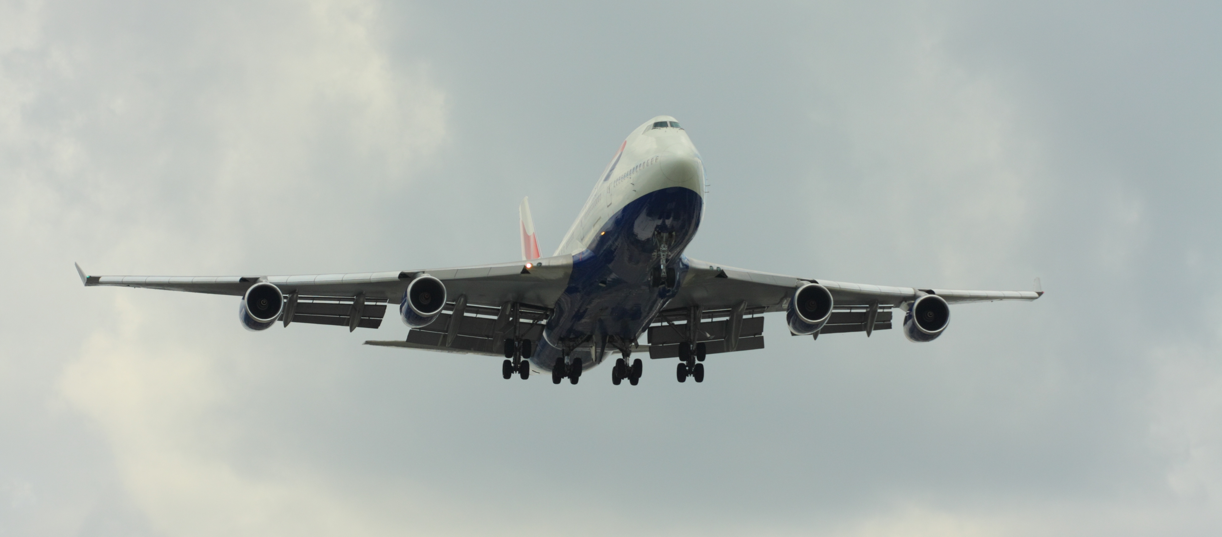 Airplane on a cloudy sky
